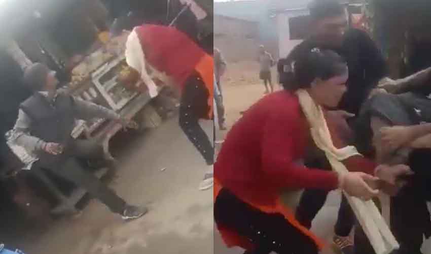 Girl Beat Up Shopkeeper : తన తండ్రిని కొట్టాడని కూతురు విశ్వరూపం.. కర్రతో చితకబాదేసింది