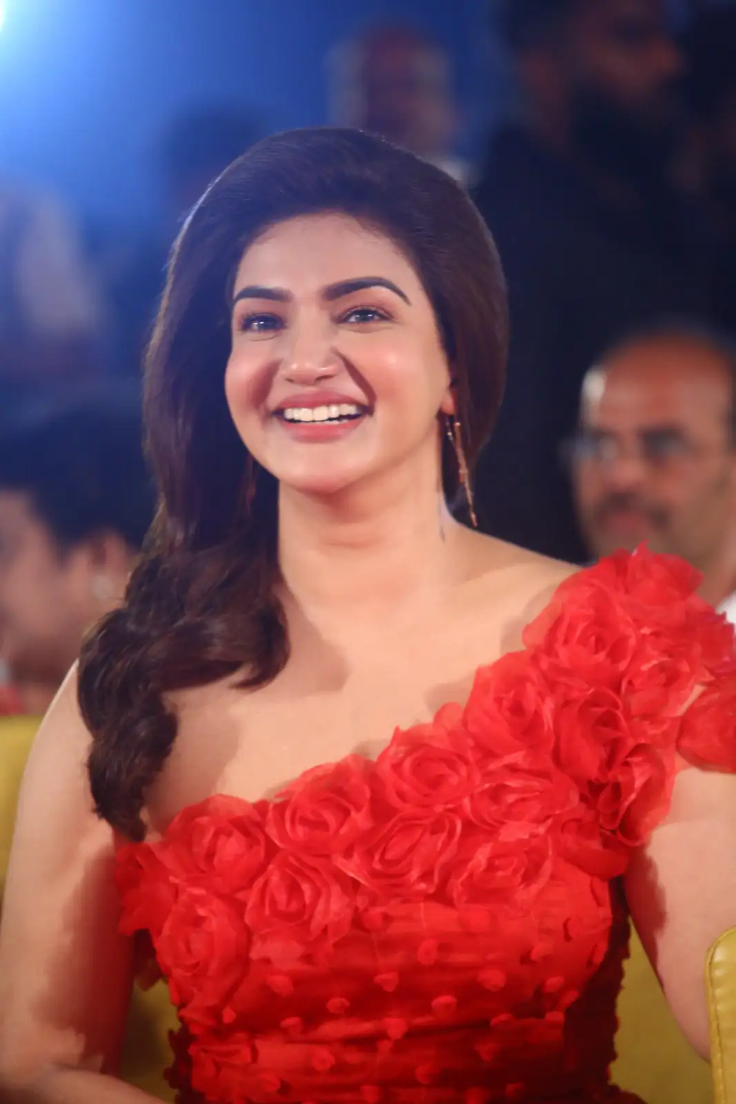 Honey Rose shines with Red Dress in Veerasimha Reddy Pre Release Event