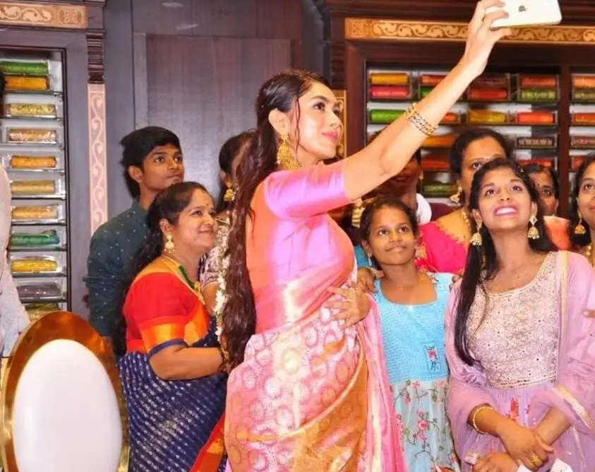 Mrunal Thakur at the inauguration of a shopping mall in Vijayawada