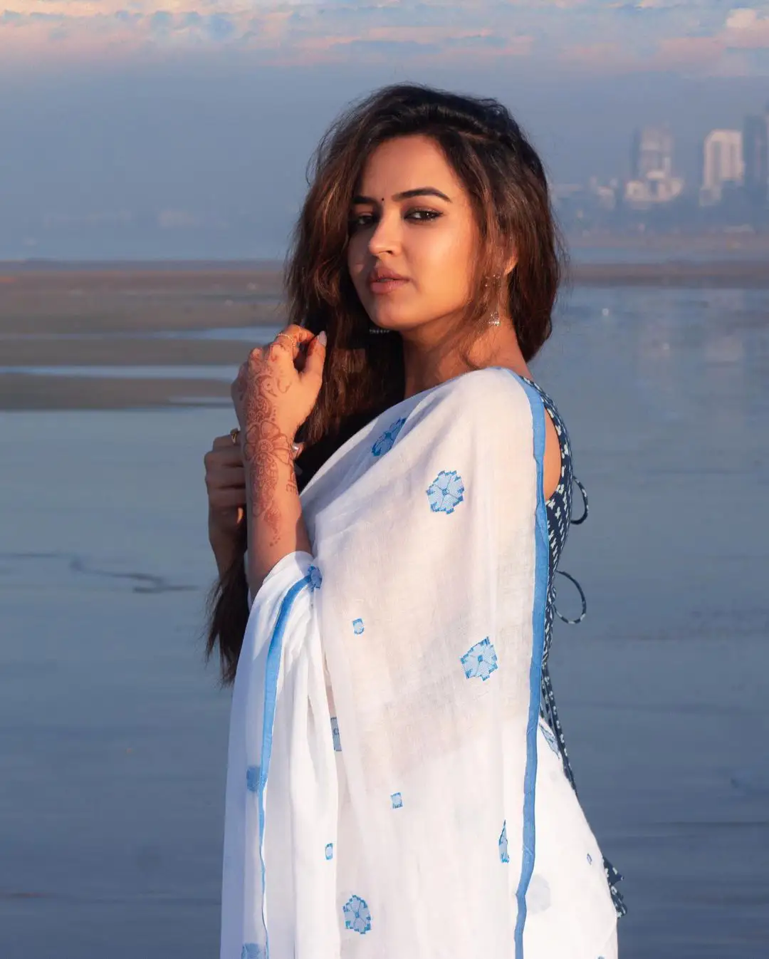 Pujita Ponnada cute photos in Saree at Beach