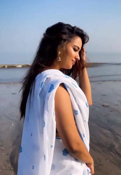 Pujita Ponnada cute photos in Saree at Beach