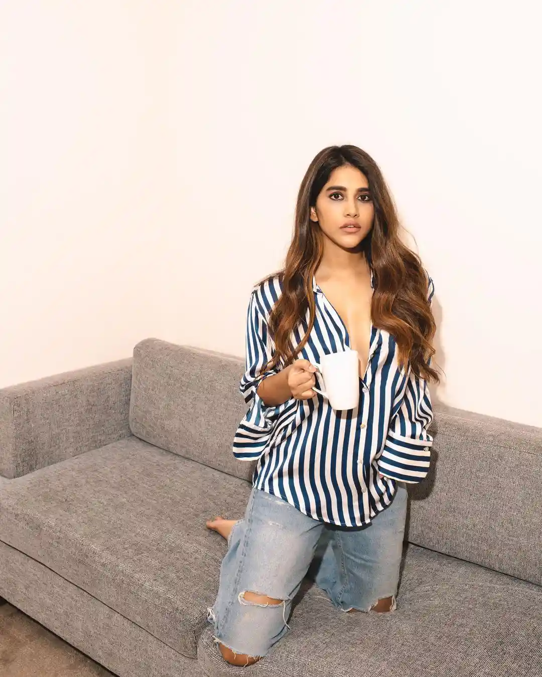 Nabha Natesh Stylish looks with coffee cup in Modern outfit