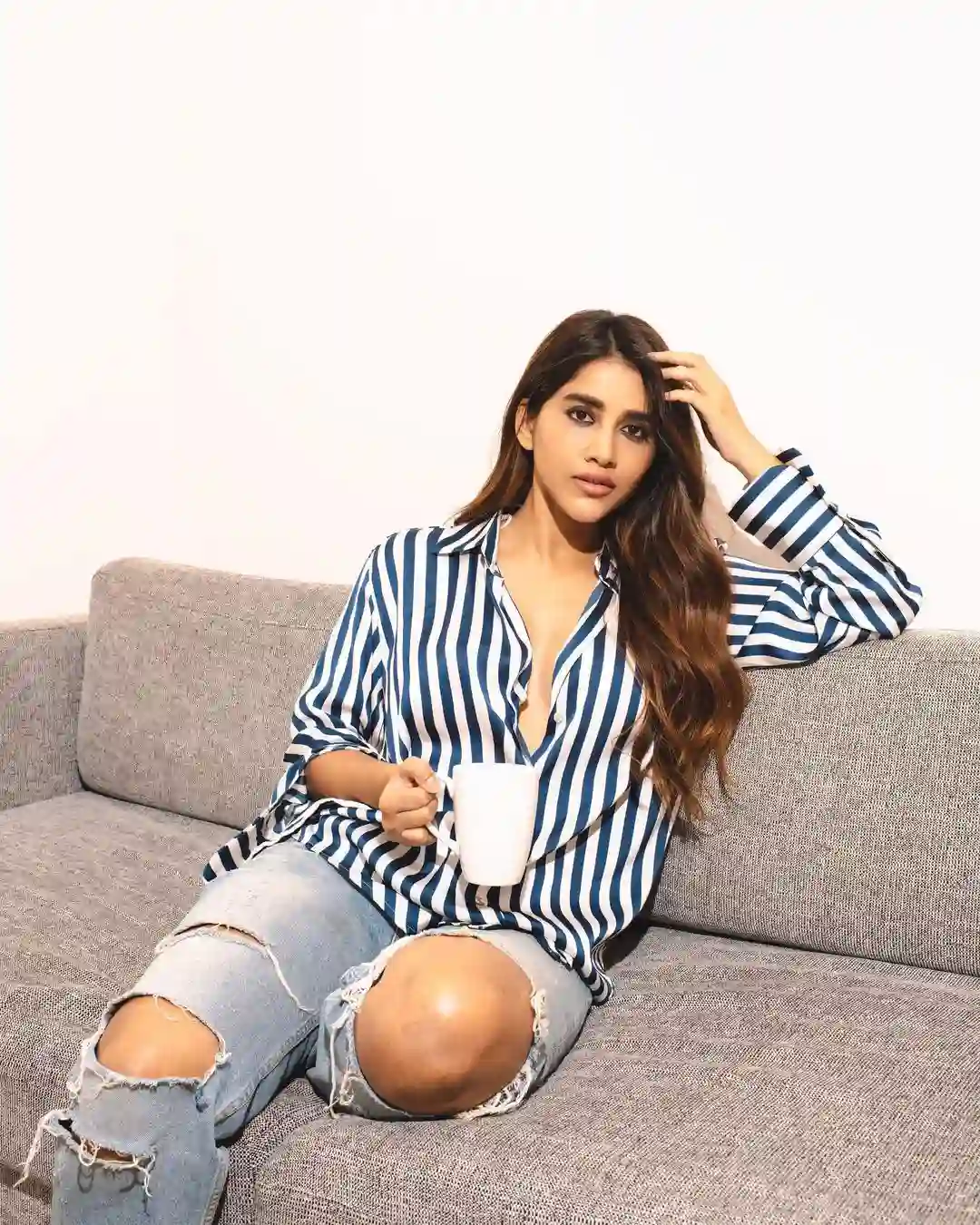 Nabha Natesh Stylish looks with coffee cup in Modern outfit