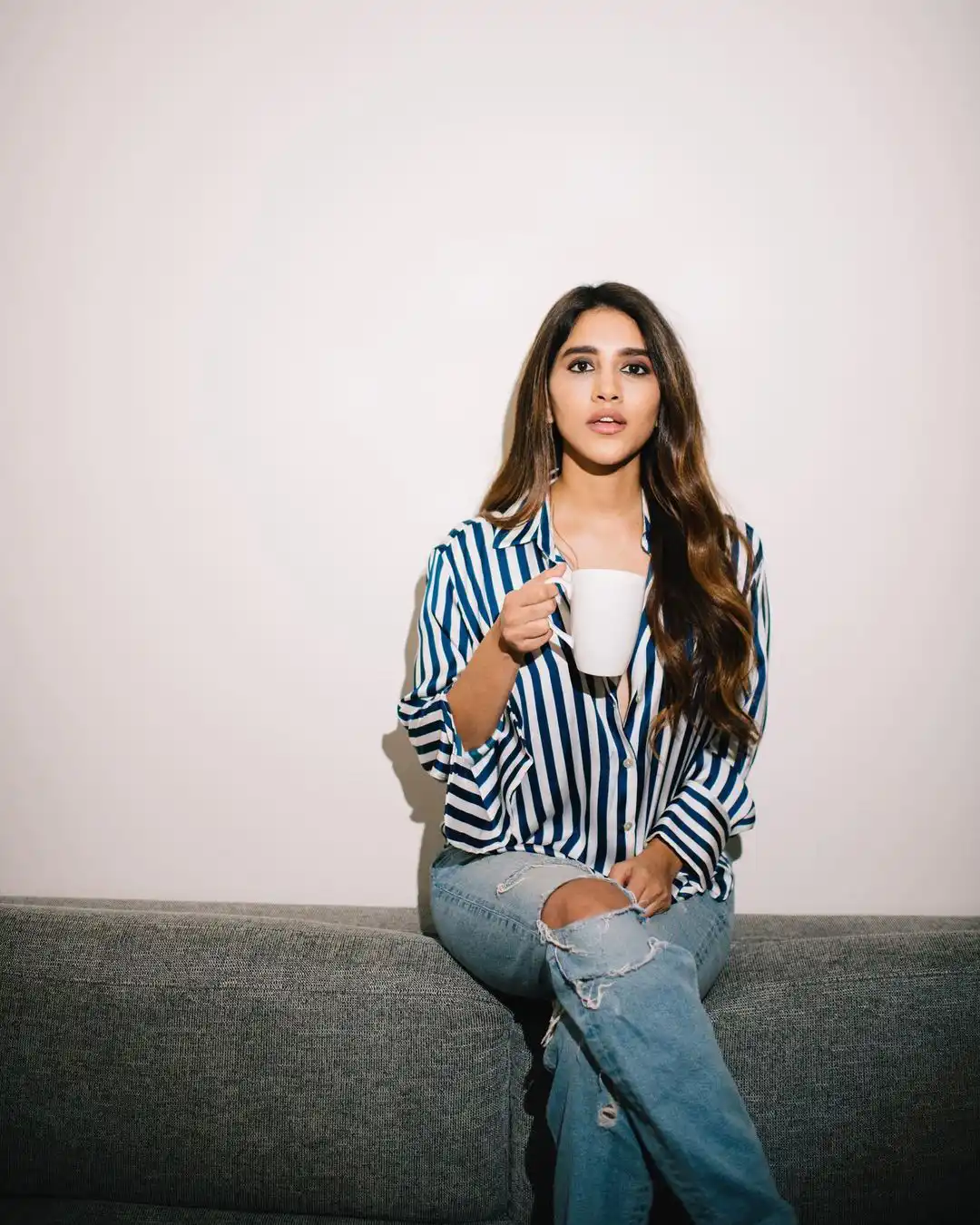 Nabha Natesh Stylish looks with coffee cup in Modern outfit