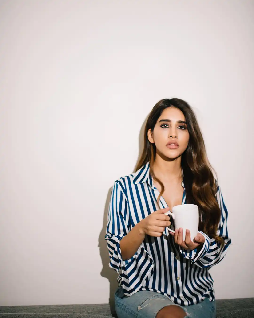 Nabha Natesh Stylish looks with coffee cup in Modern outfit