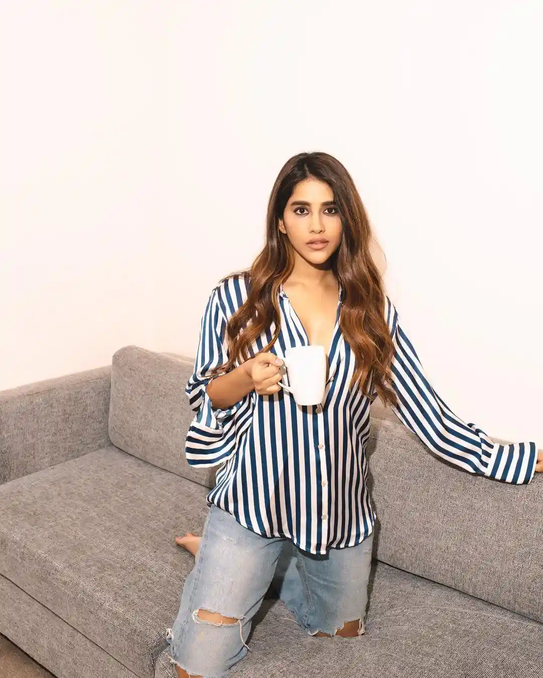 Nabha Natesh Stylish looks with coffee cup in Modern outfit