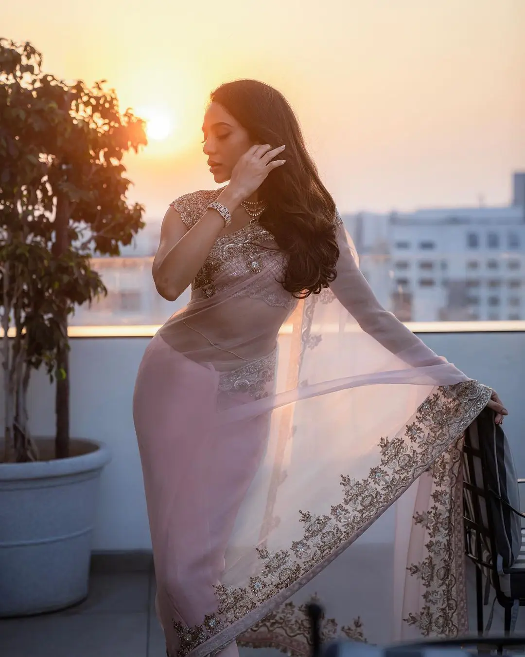 Sobhita Dhulipala shines in a light pink color saree