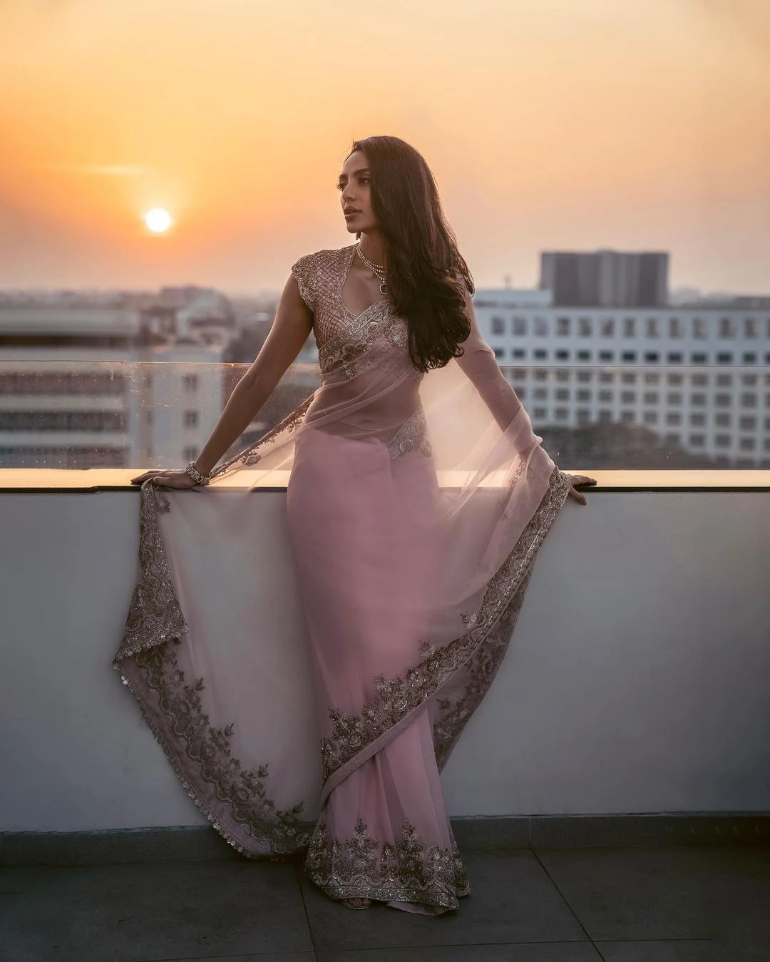Sobhita Dhulipala shines in a light pink color saree