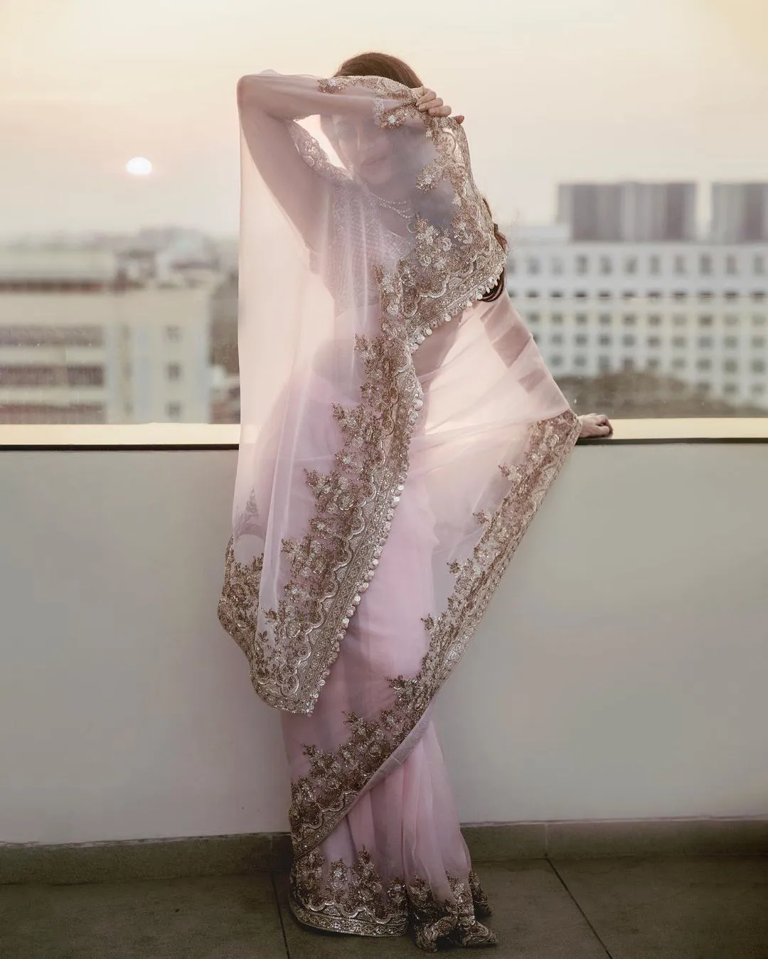 Sobhita Dhulipala shines in a light pink color saree