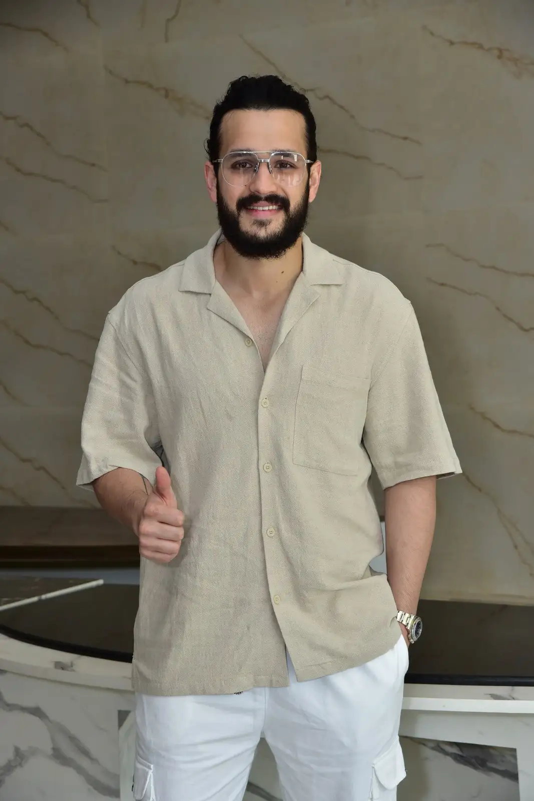 Akhil Akkineni stylish looks in agent movie promotions