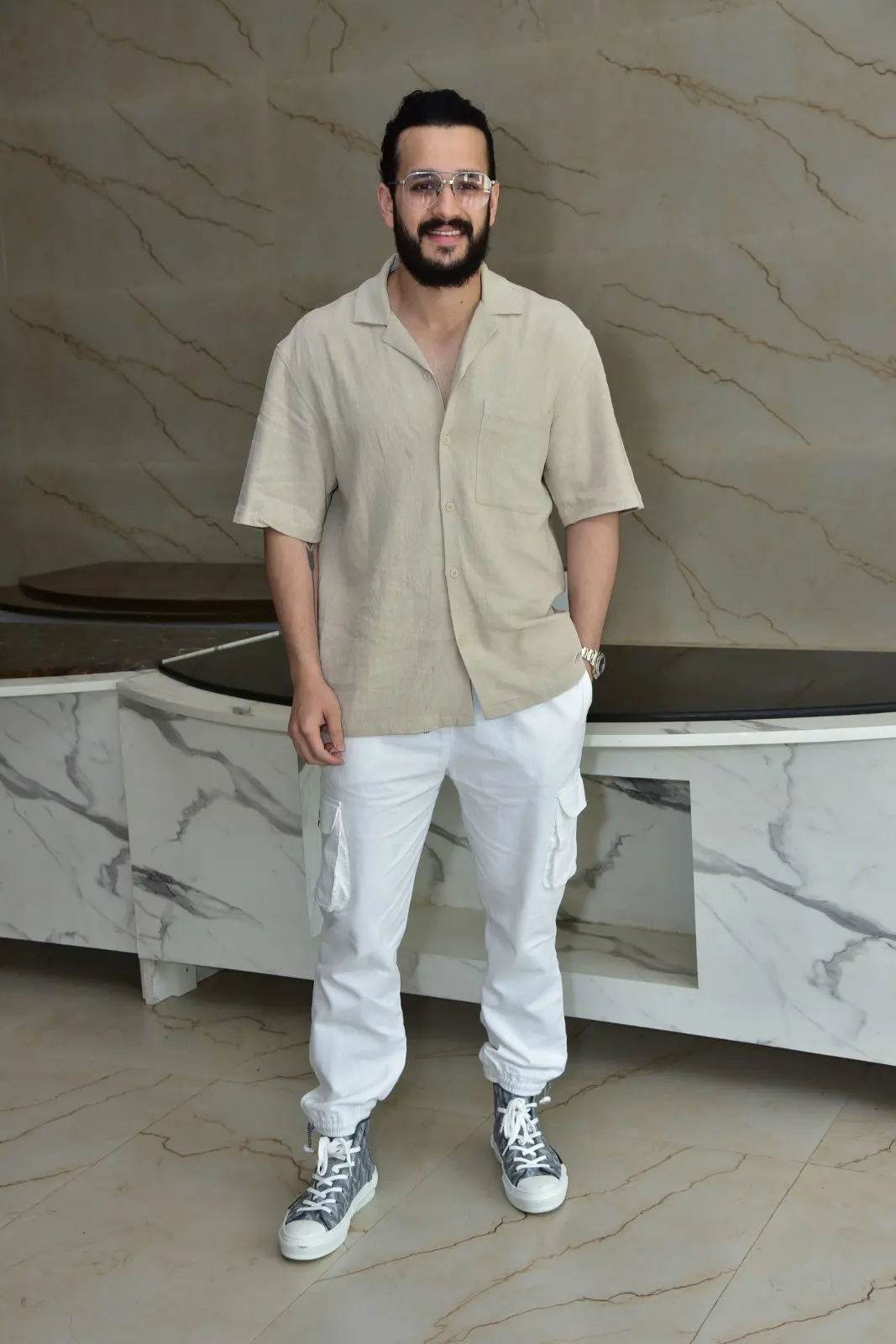 Akhil Akkineni stylish looks in agent movie promotions