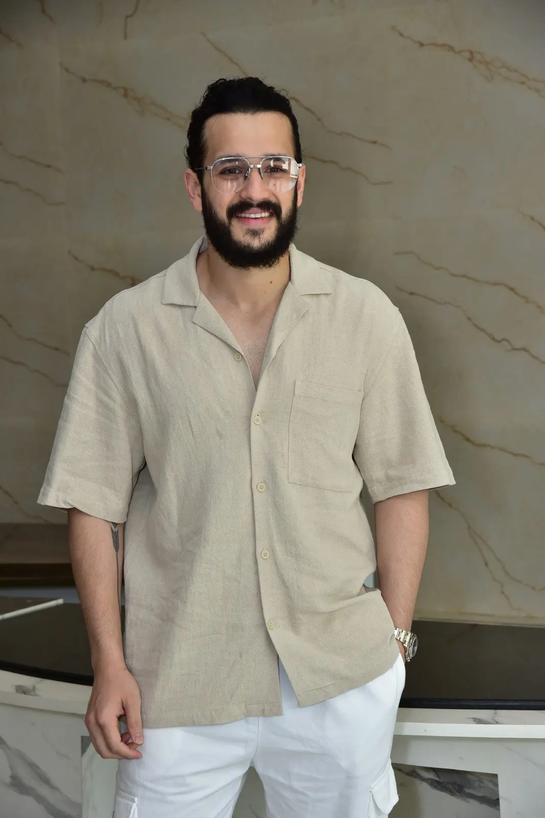 Akhil Akkineni stylish looks in agent movie promotions