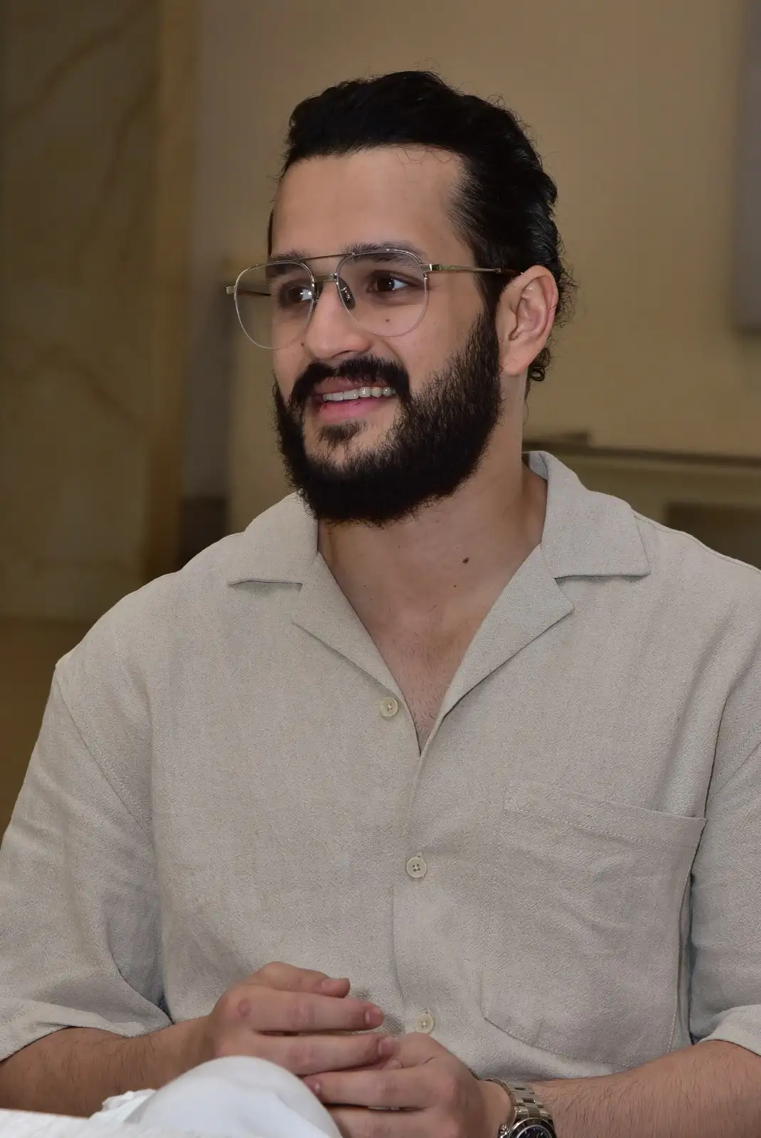 Akhil Akkineni stylish looks in agent movie promotions