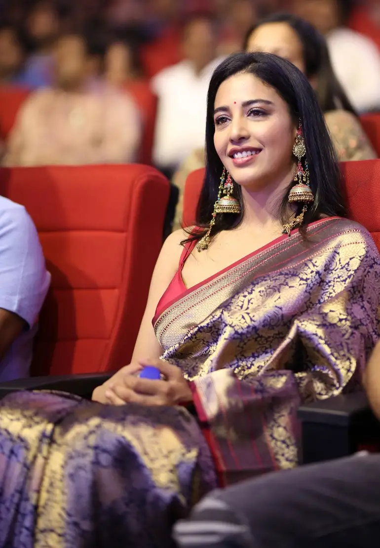 Daksha Nagarkar shines in Saree at Ravanasura pre Release Event