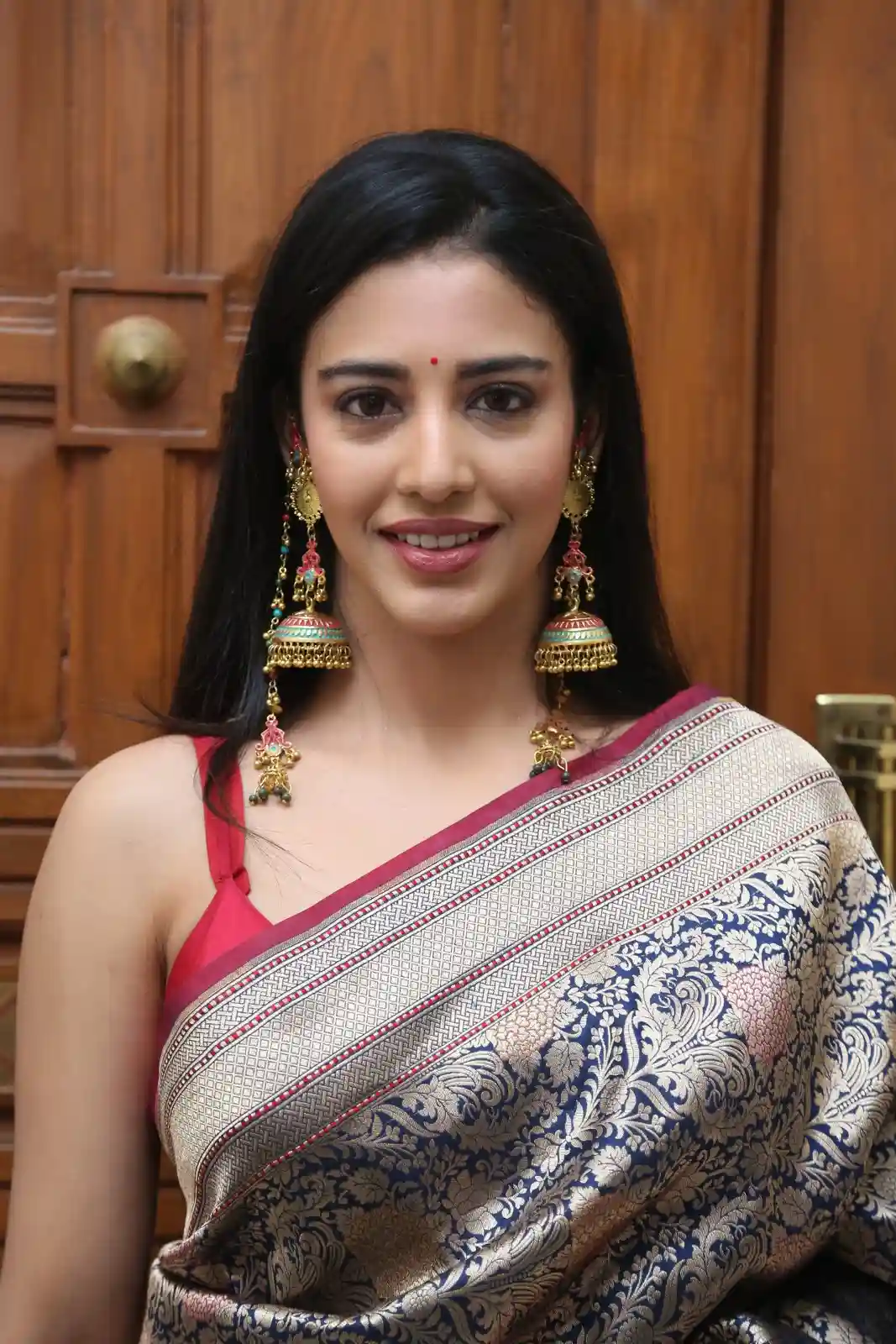 Daksha Nagarkar shines in Saree at Ravanasura pre Release Event