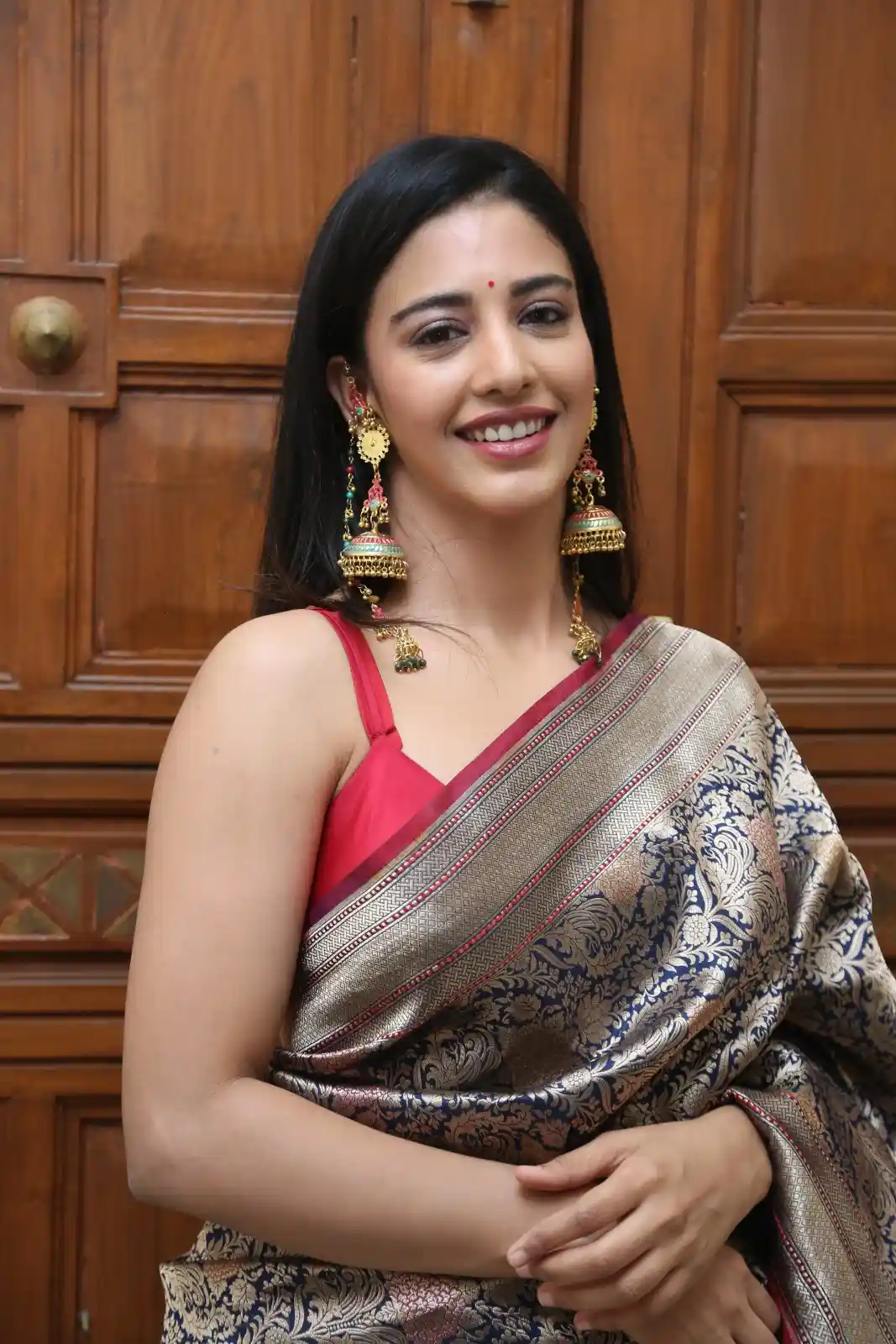 Daksha Nagarkar shines in Saree at Ravanasura pre Release Event