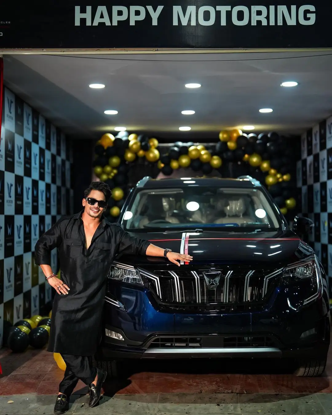 Mehaboob Dil Se poses with his new car