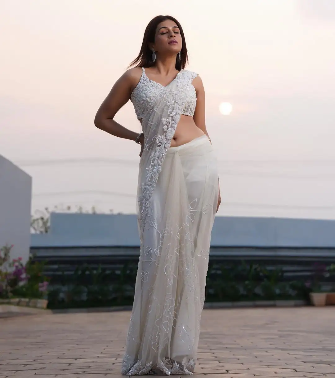 Shraddha Das stunning looks in White Saree