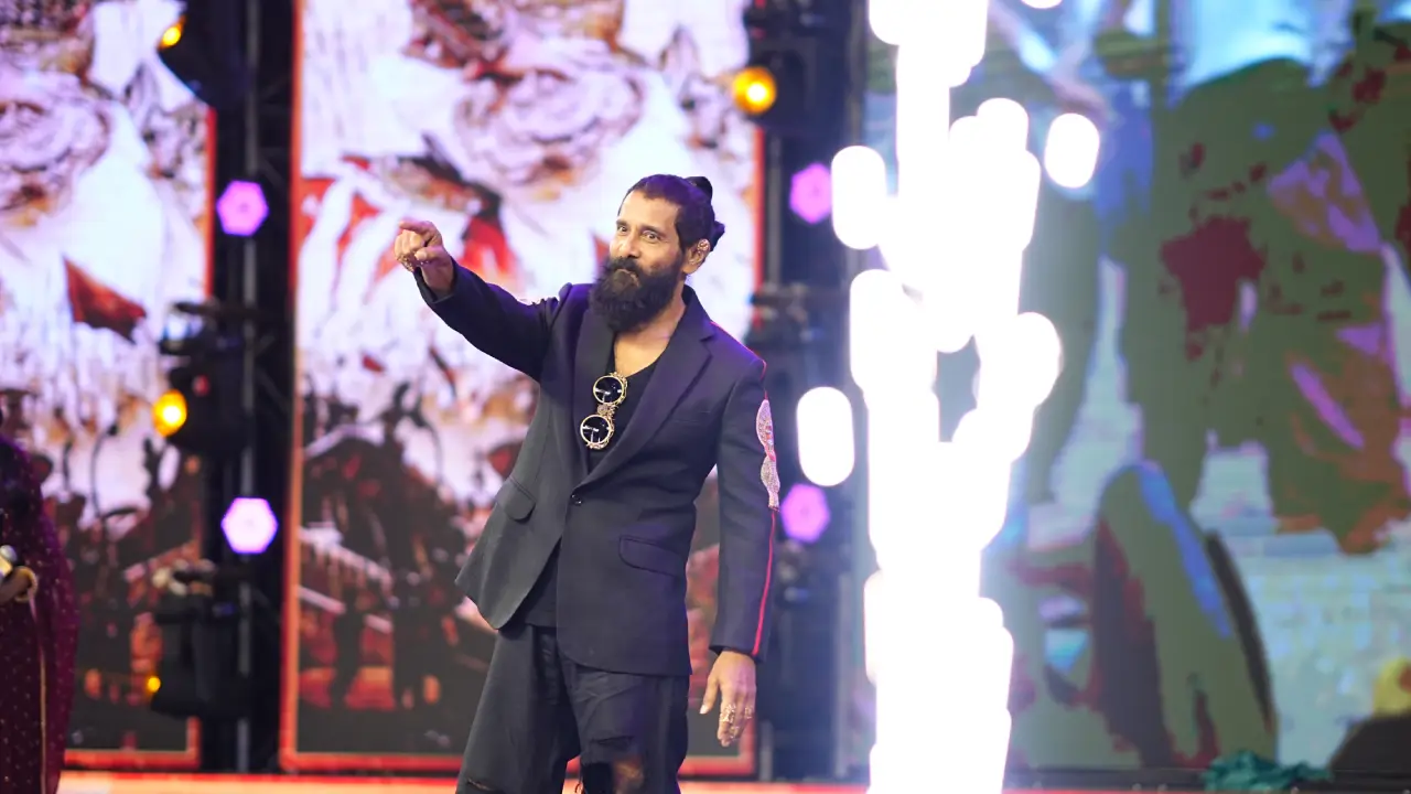 Vikram Stylish looks in Ponniyin Selvan 2 Pre Release Event at Hyderabad