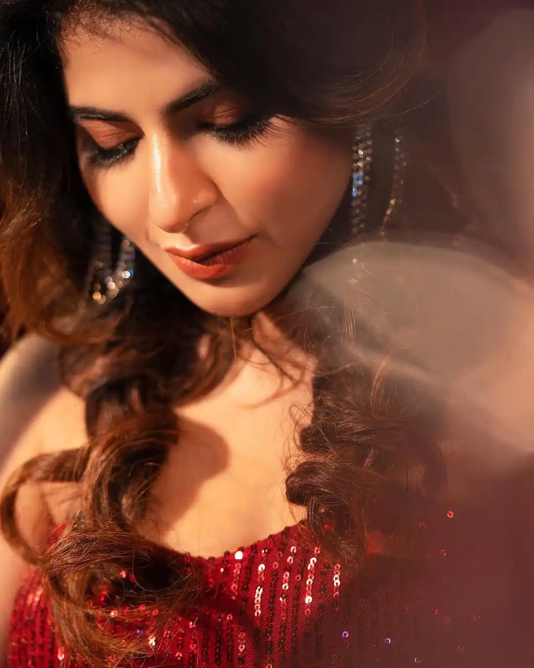 Iswarya Menon sizzling Photo Shoot in Red Dress