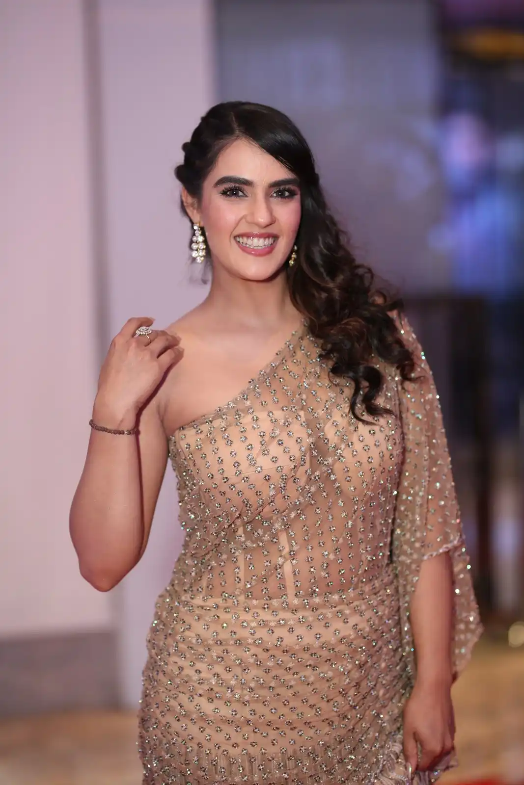 Kavya Thapar shines in different saree at Bichagadu 2 Pre Release Event