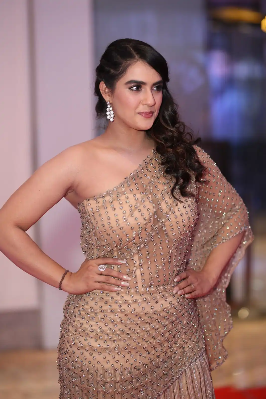 Kavya Thapar shines in different saree at Bichagadu 2 Pre Release Event