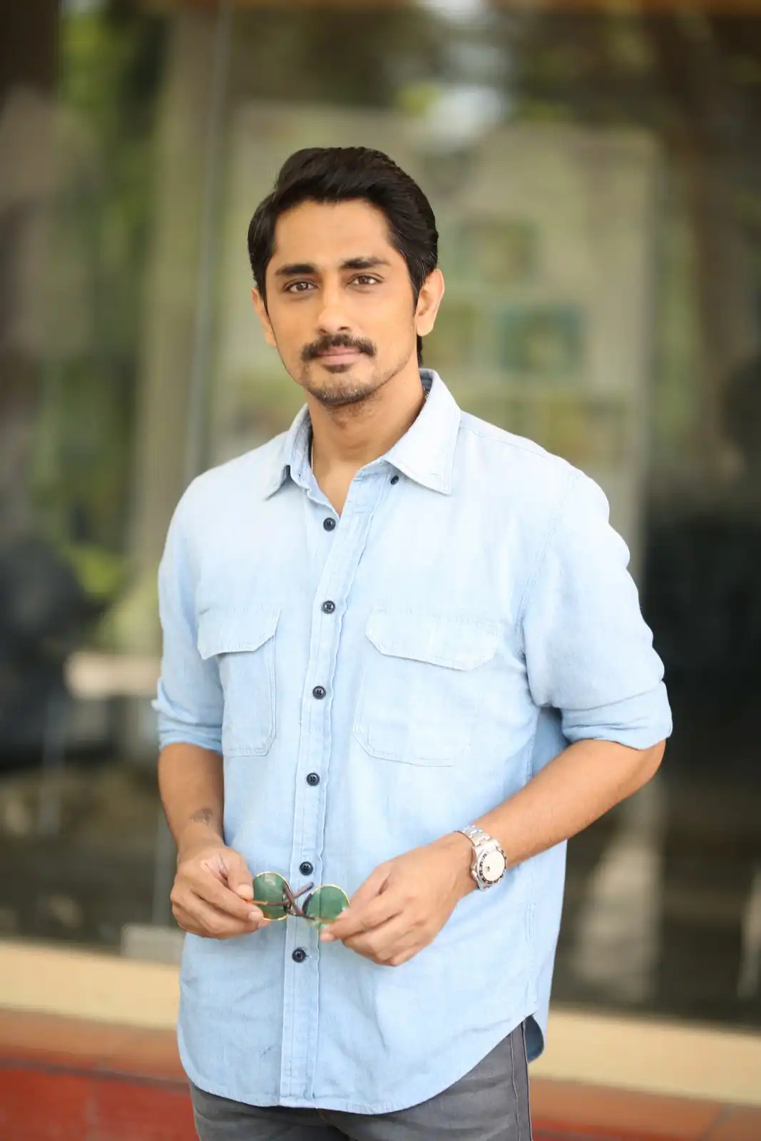 Siddharth Stylish Looks in Takkar Movie Promotions