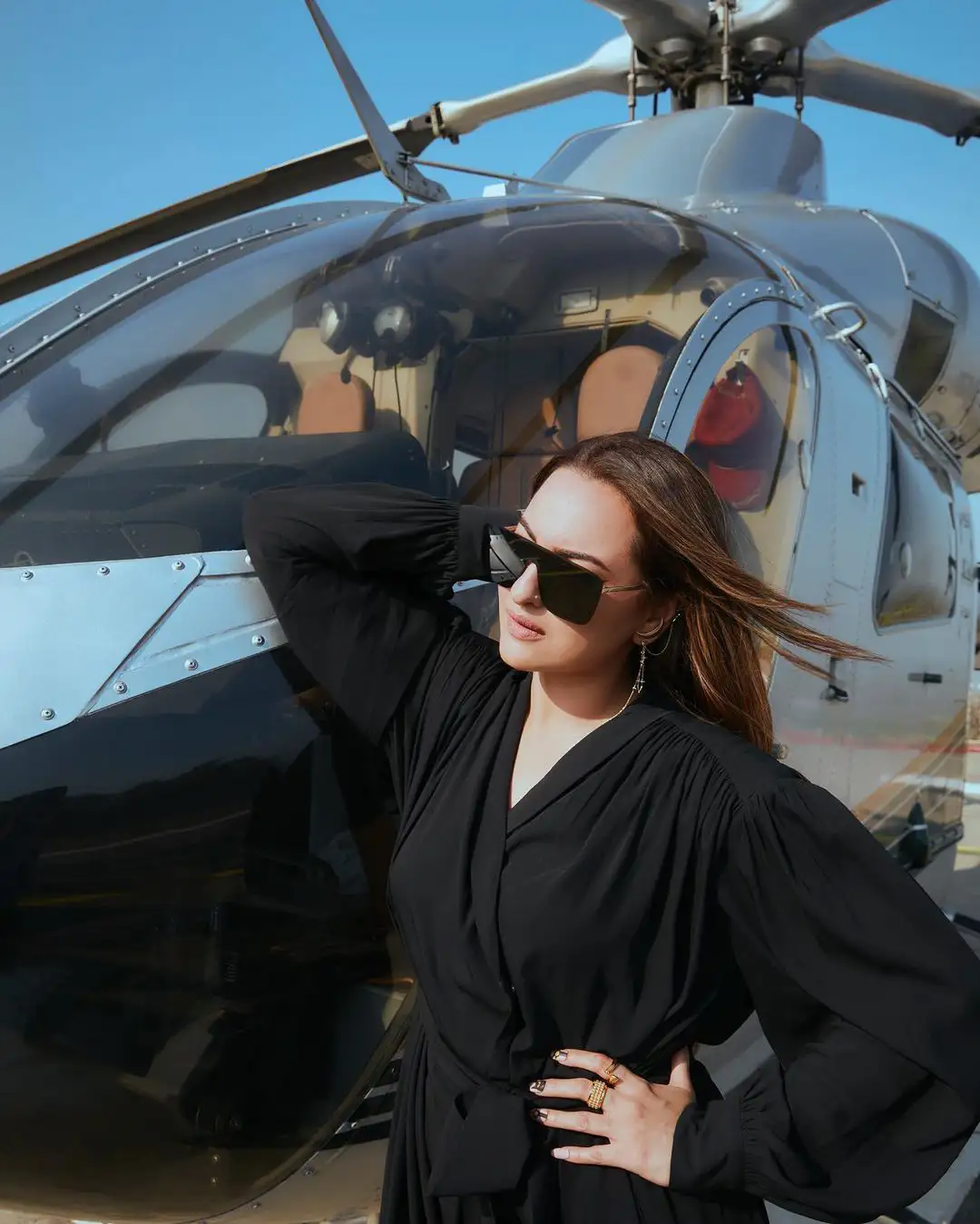 Sonakshi Sinha Stylish Poses with Helicopter