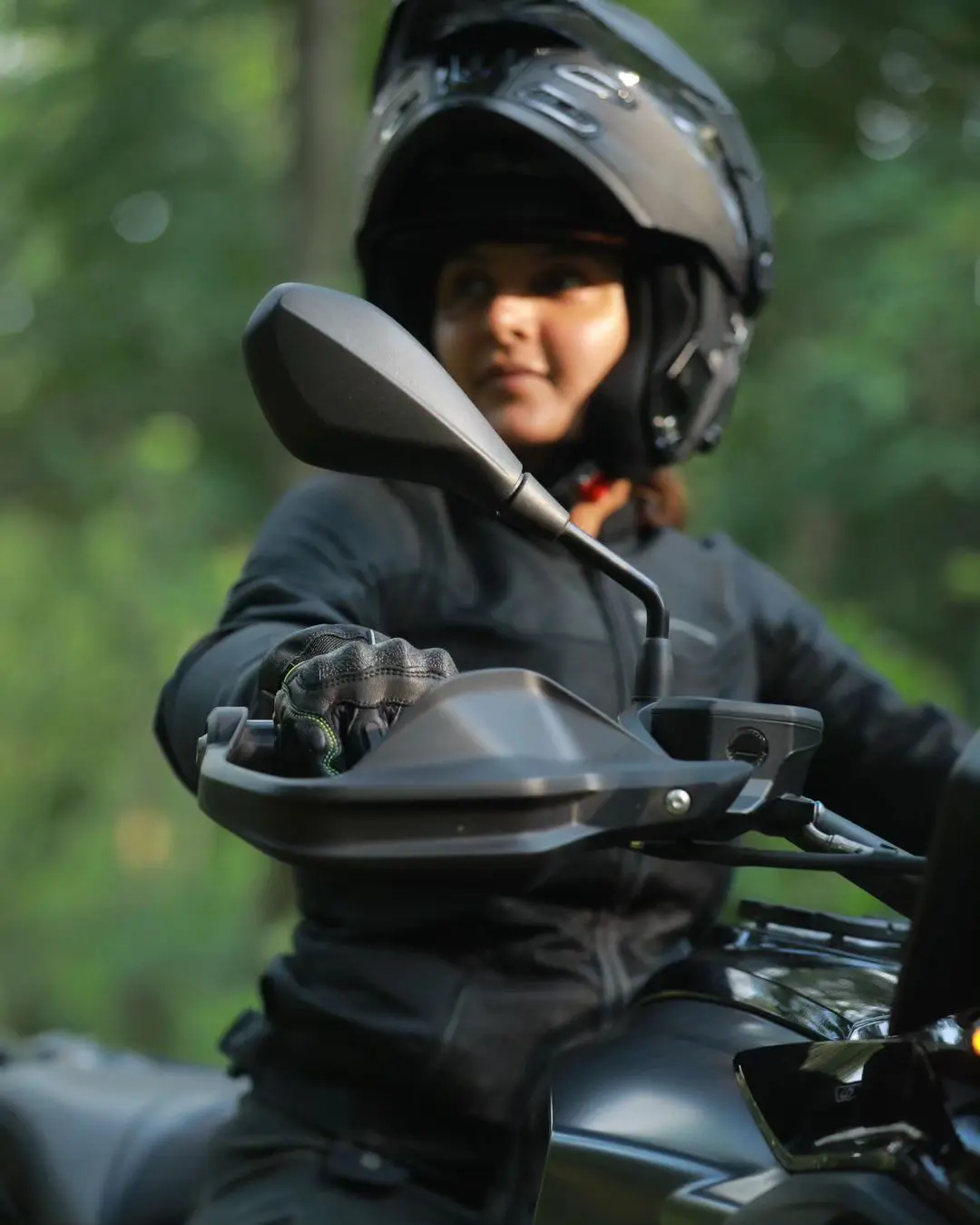 Malayala Actress Manju Warrier Bike Riding at Forest area photos