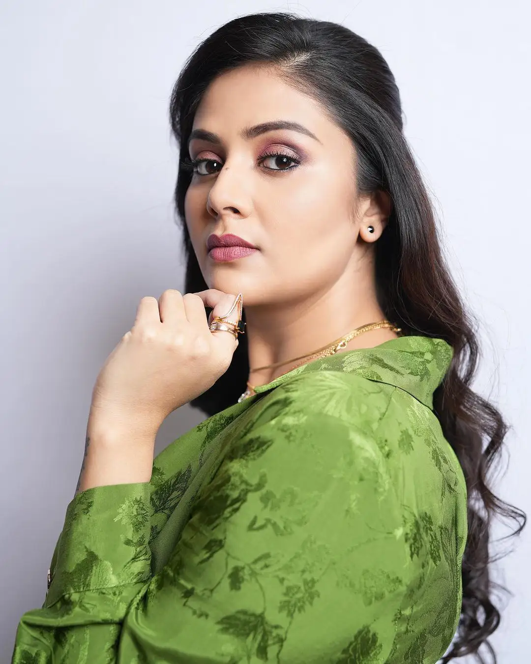 Sreemukhi Latest Photo shoot in Short Green Dress