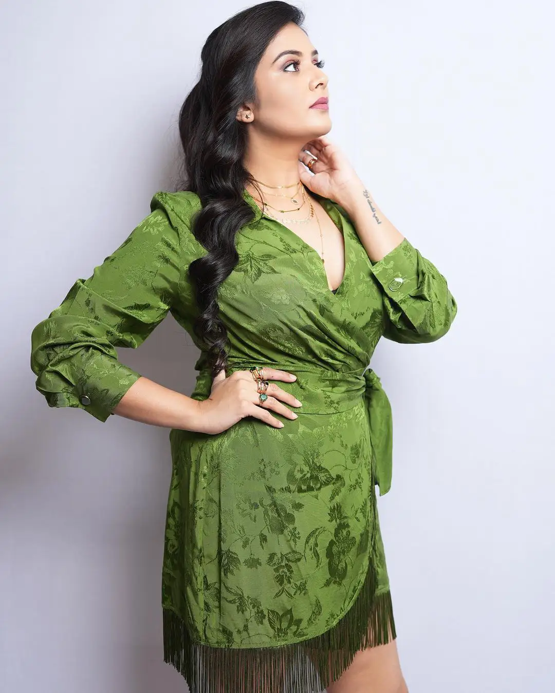 Sreemukhi Latest Photo shoot in Short Green Dress
