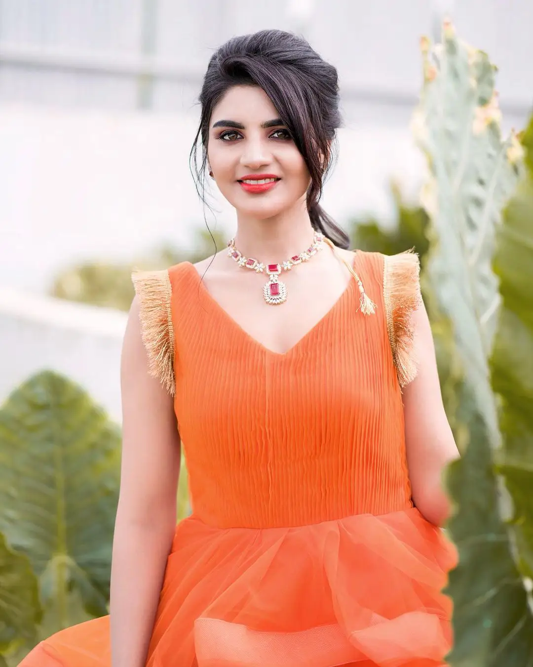 Jabardasth Varsha Photos in orange dress gone viral
