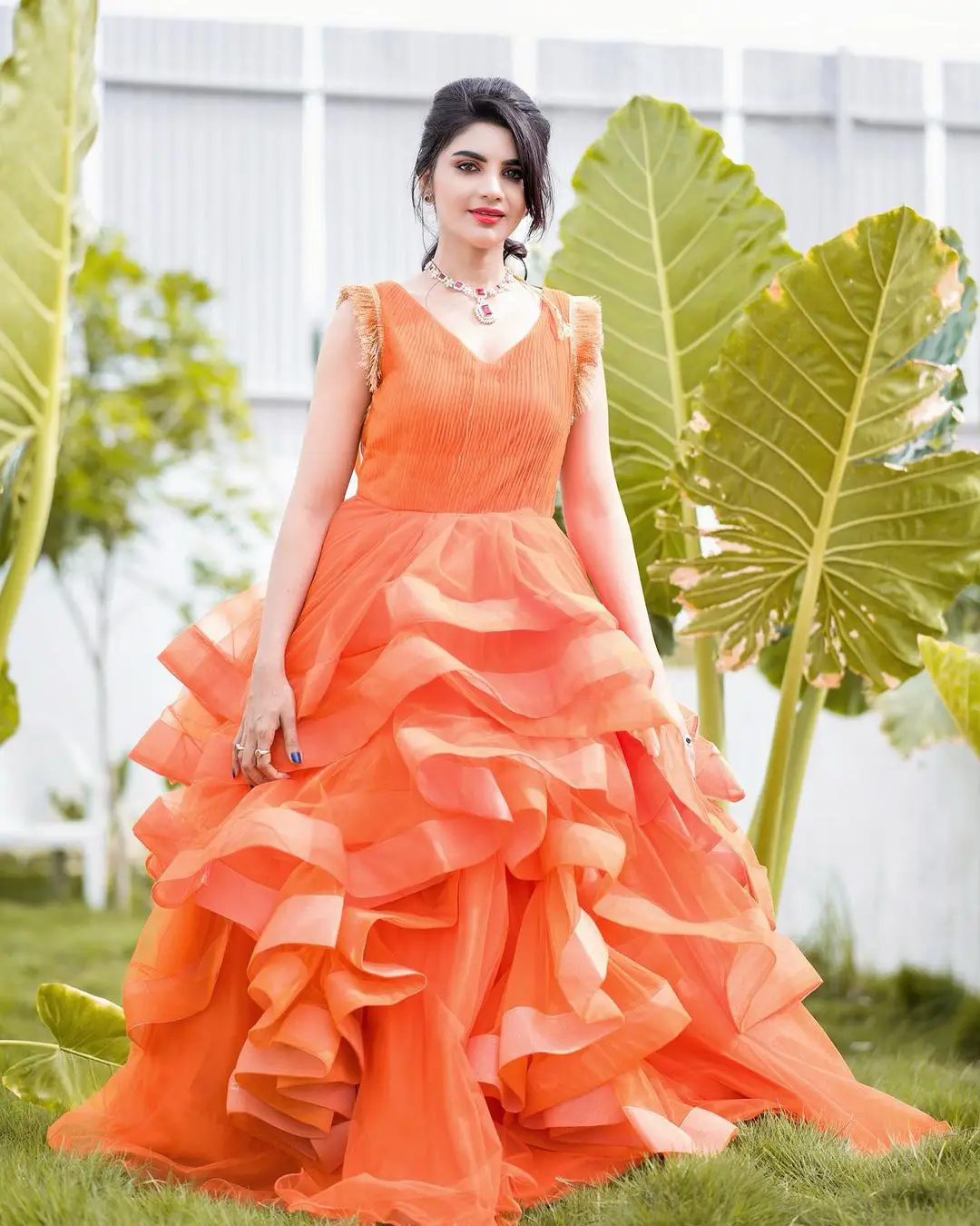 Jabardasth Varsha Photos in orange dress gone viral