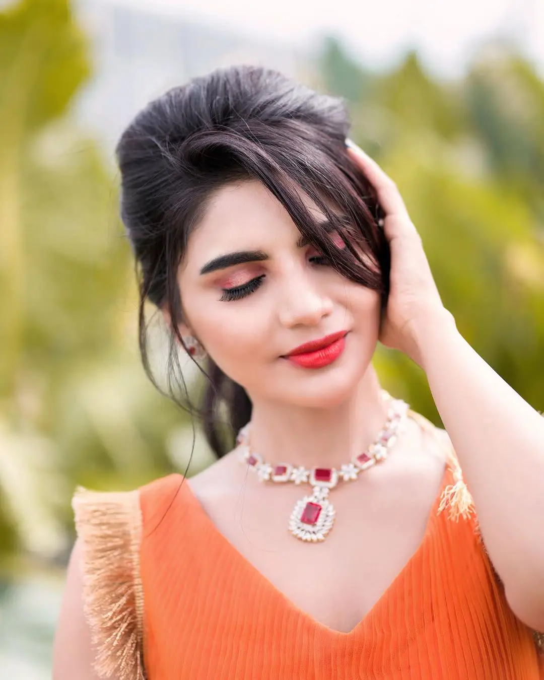Jabardasth Varsha Photos in orange dress gone viral