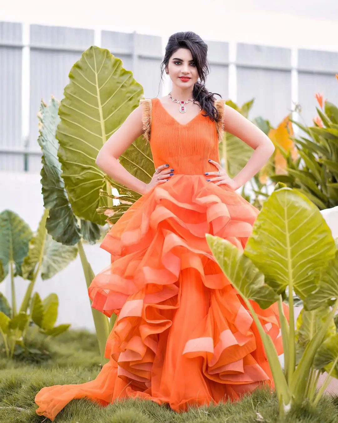 Jabardasth Varsha Photos in orange dress gone viral