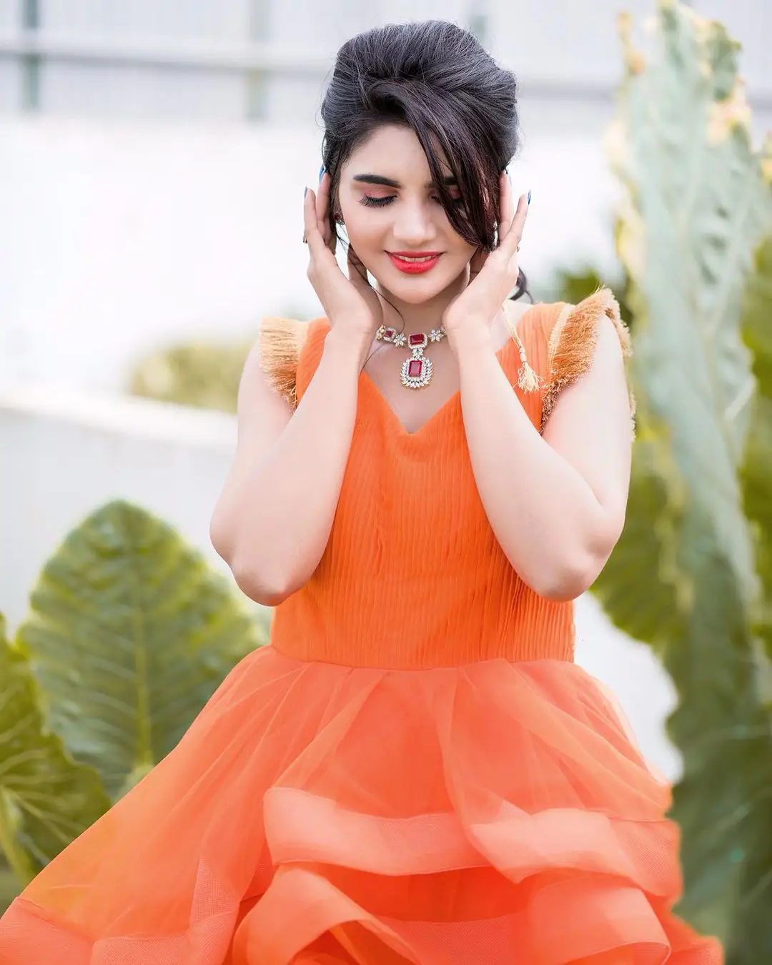 Jabardasth Varsha Photos in orange dress gone viral