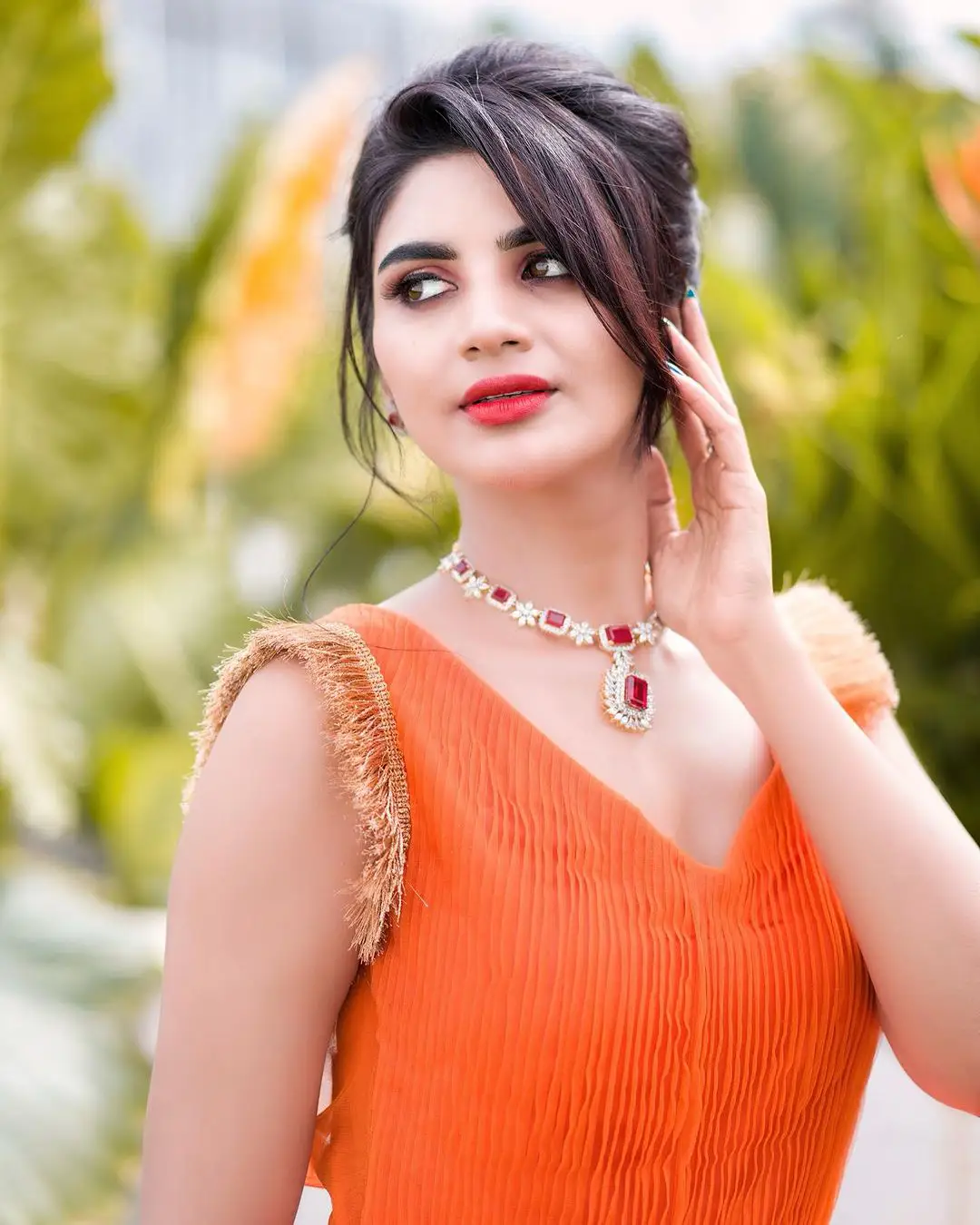 Jabardasth Varsha Photos in orange dress gone viral