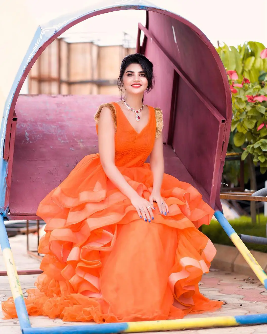 Jabardasth Varsha Photos in orange dress gone viral