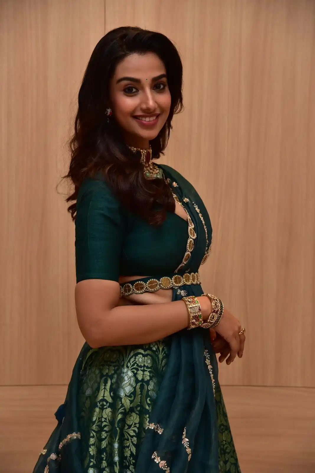 Meenakshi Chaudhary latest stills in Half Saree