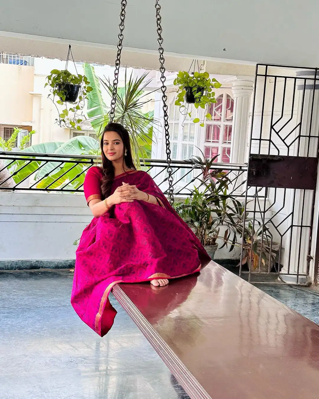 Pujita Ponnada poses on Swing Cradle at her Home
