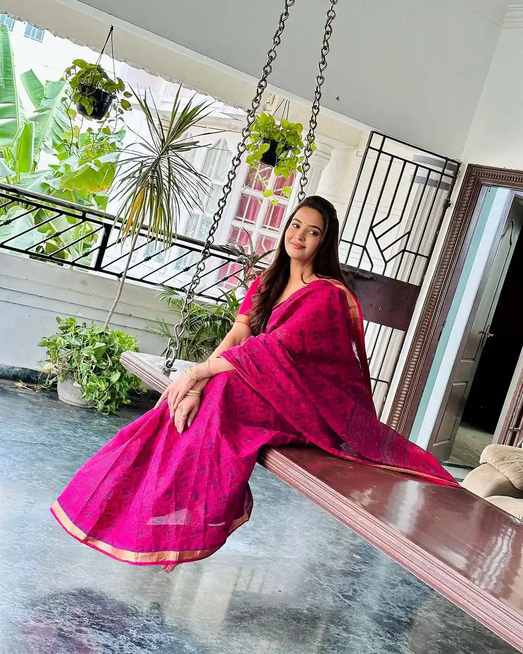 Pujita Ponnada poses on Swing Cradle at her Home