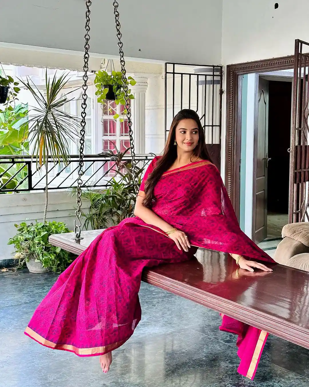 Pujita Ponnada poses on Swing Cradle at her Home