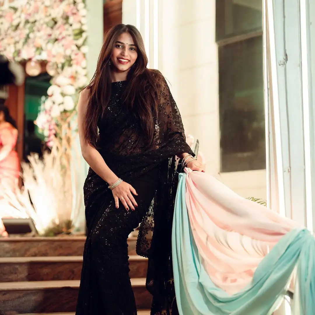 Sapthami Gowda Shines in Black Saree