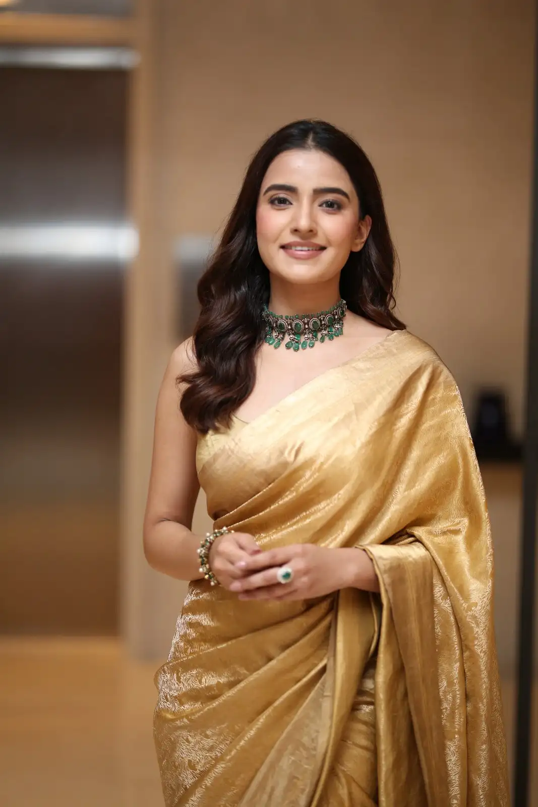 Rukshaar Dhillon Shines in Gold color Saree