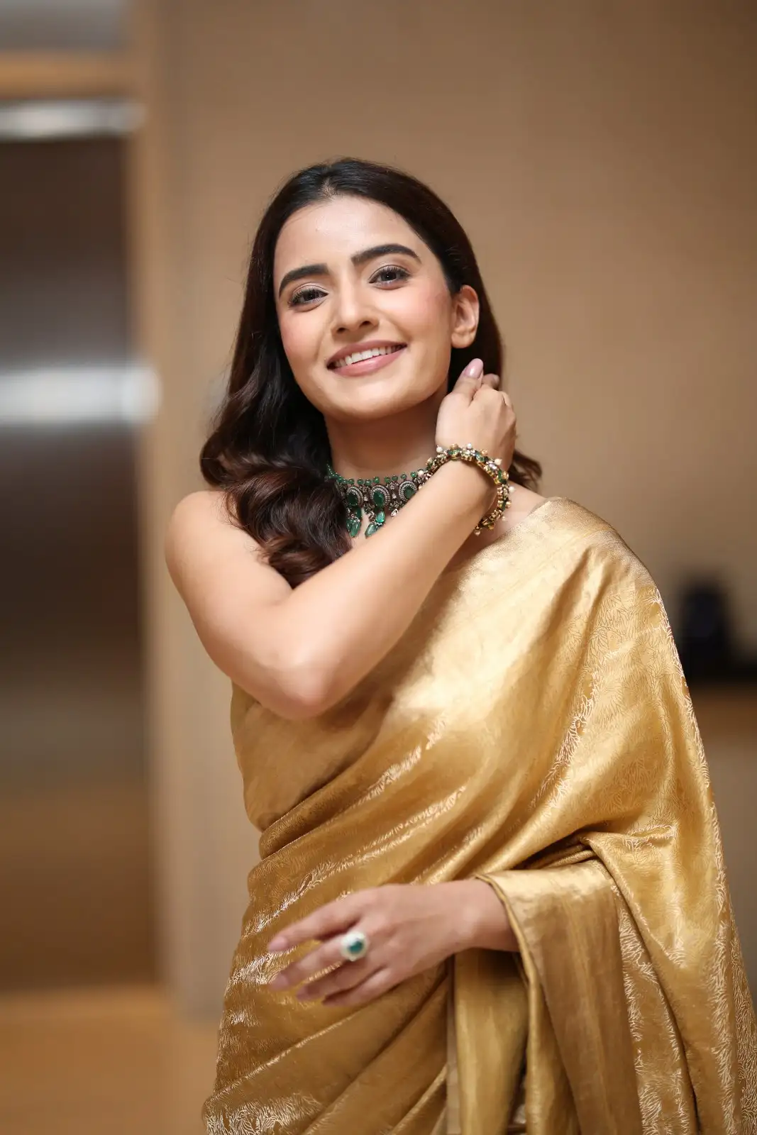 Rukshaar Dhillon Shines in Gold color Saree