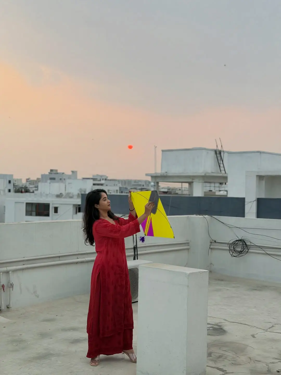 Deepthi Sunaina flying kite on the occasion of Sankranthi festival. (1)