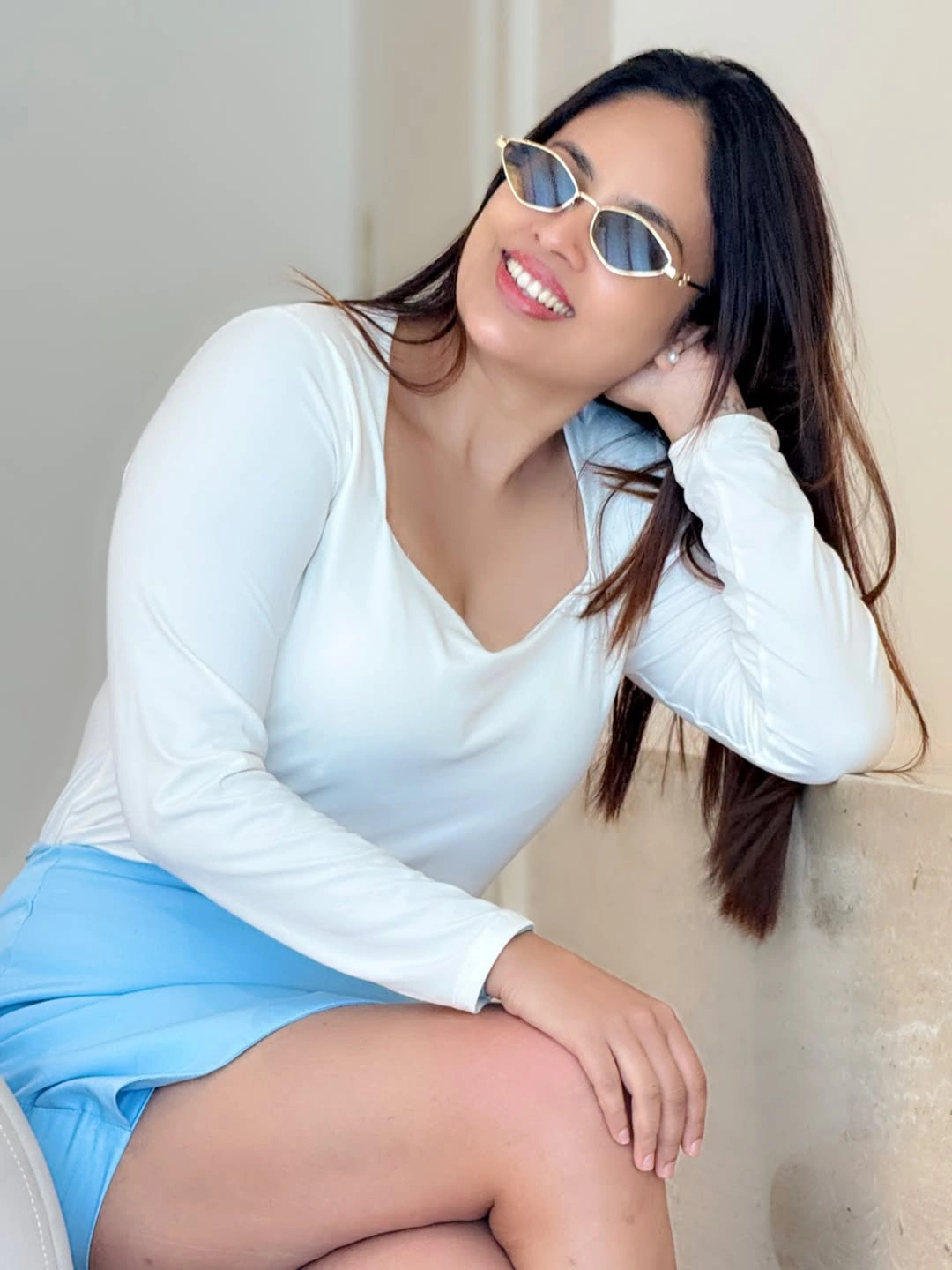 Nandita Swetha Stylish Poses in Short Skirt