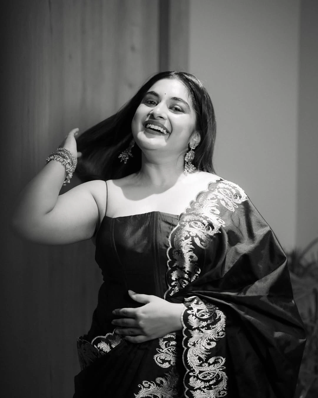 Nivetha Thomas Cute Photos in Black Dress