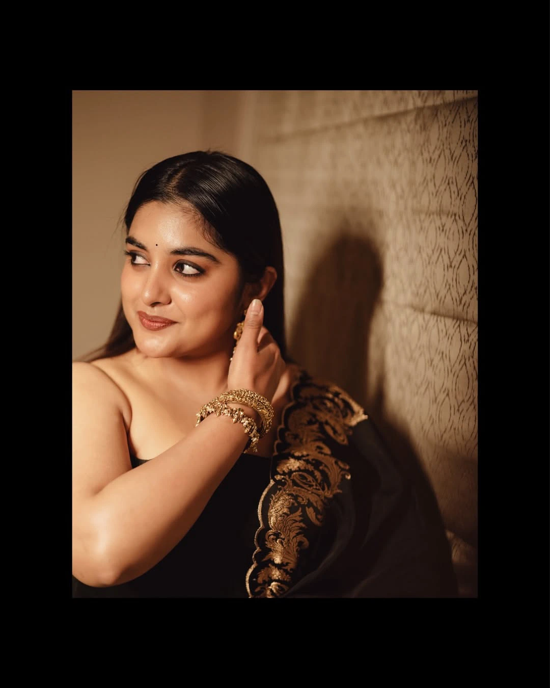 Nivetha Thomas Cute Photos in Black Dress