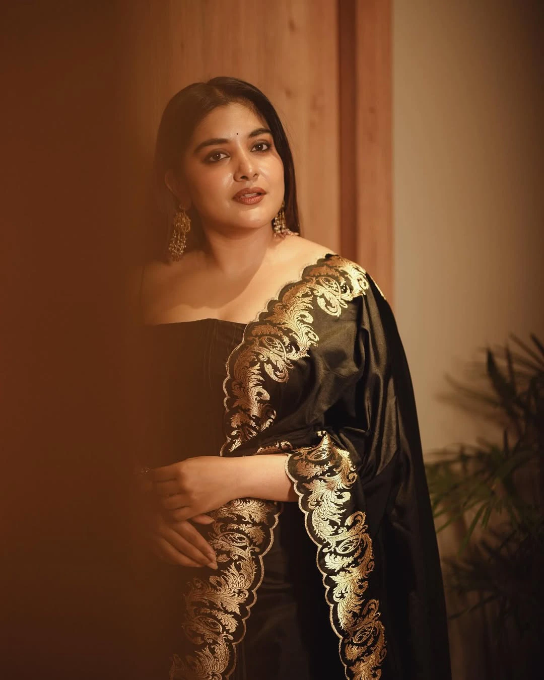 Nivetha Thomas Cute Photos in Black Dress